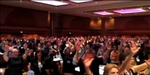 screen grab image from YouTube video of 1,200 participants at NSAC 2012